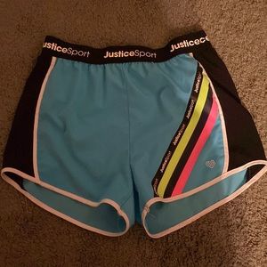 Practically new justice shorts. can’t fit them anymore.